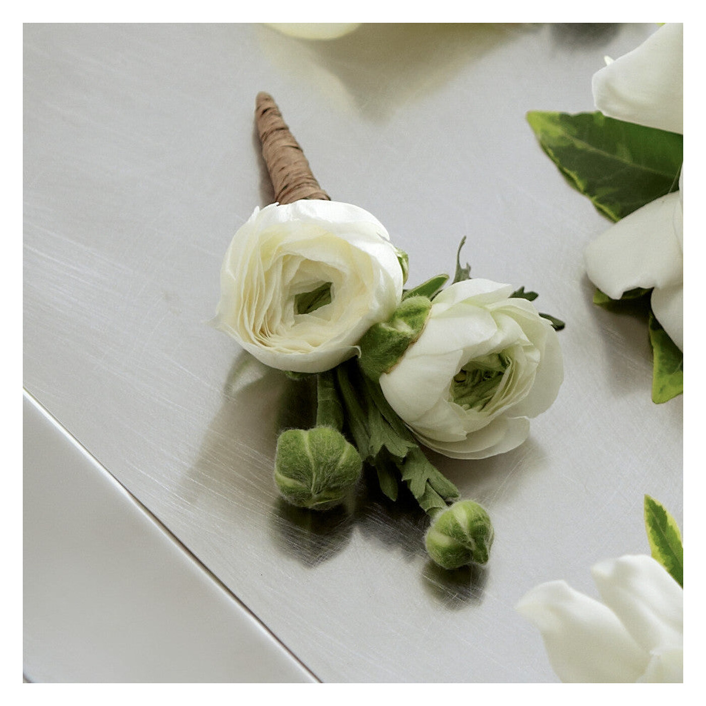 White Ranunculus Boutonniere